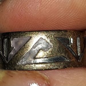 Silver aztec type thumb ring